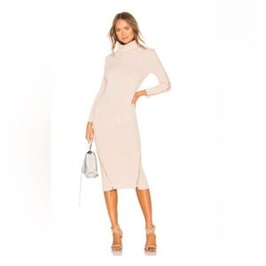 Tabula rasa sweater dress of Revolve, worn one time. Like new. Cream